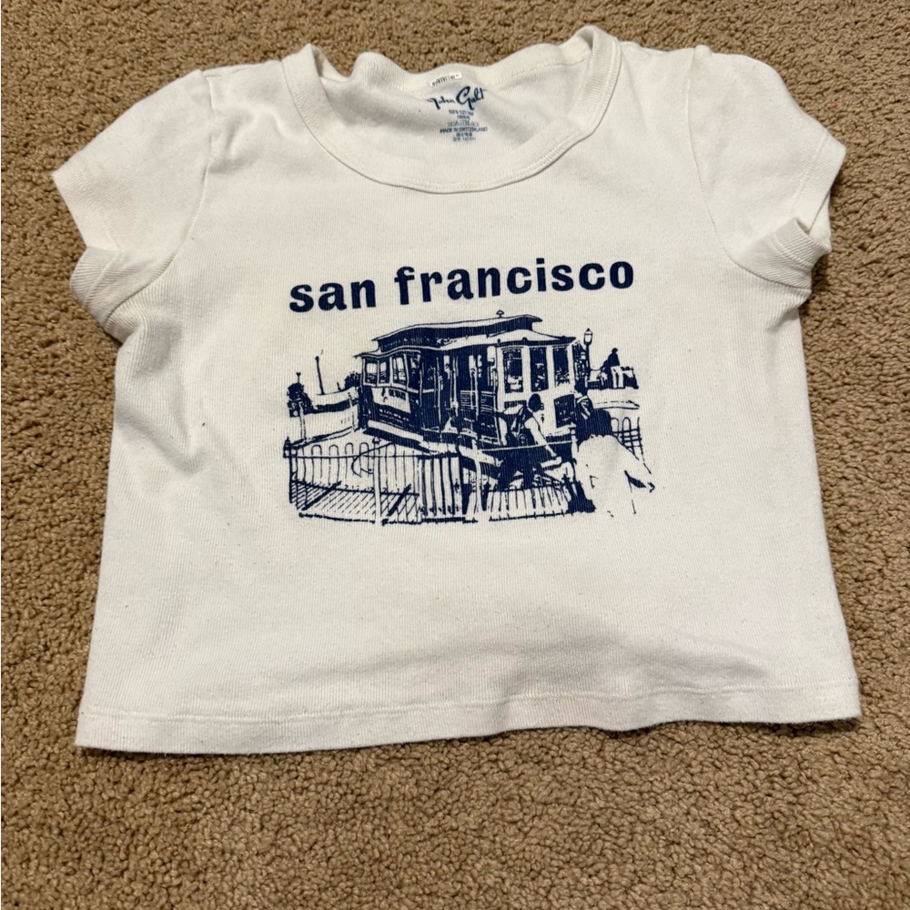 JOHN GAULT BABY TEE